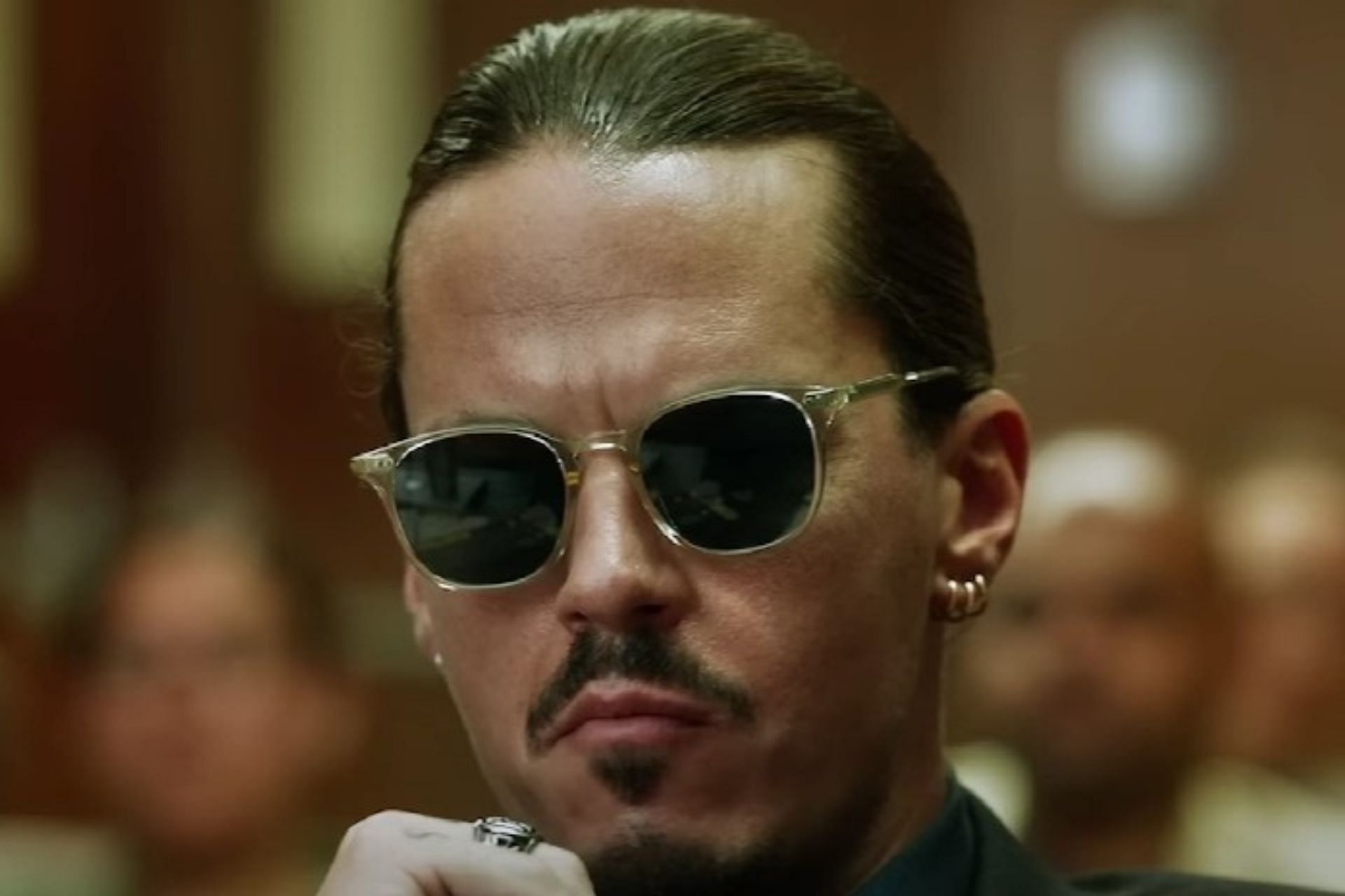 A still from Hot Take: The Depp/Heard Trial (Image via Tubi/YouTube)