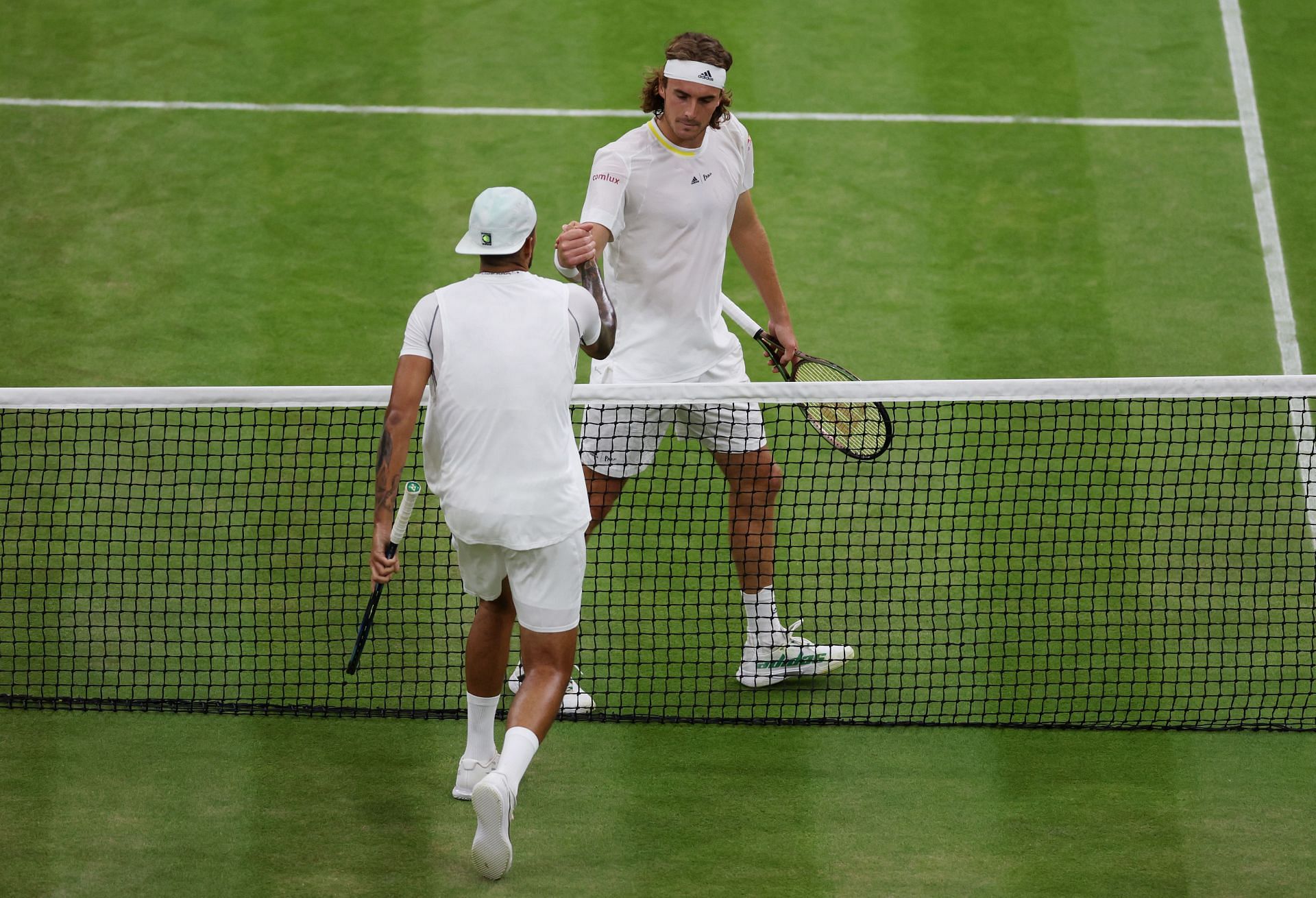 Nick Kyrgios shakes hands with Stefanos Tsitsipas after their third round match in Wimbledon 