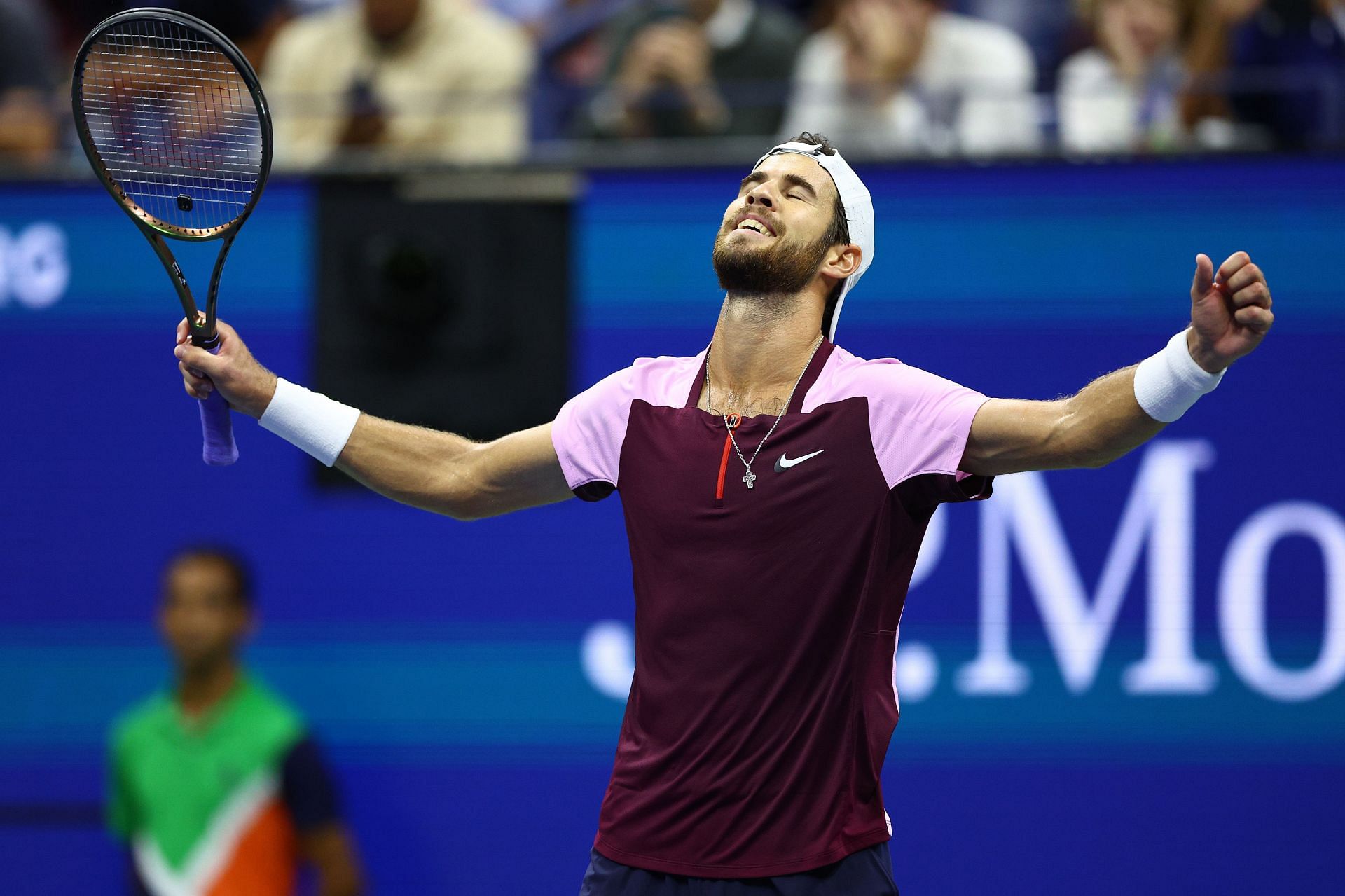 Karen Khachanov celebrates after defeating Nick Kyrgios in the 2022 US Open quarterfinal.