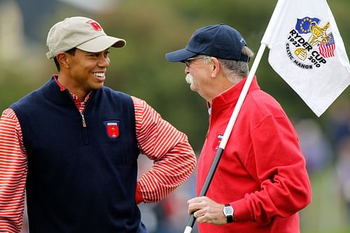 Tiger Woods and Mike 'Fluff' Cowen (Image via Sam Greenwood/Getty Images)