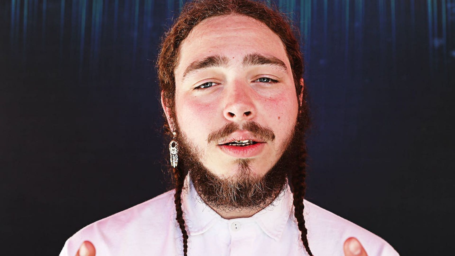 Post Malone has been hospitalized. (Image via Randy Shropshire/Getty Images)