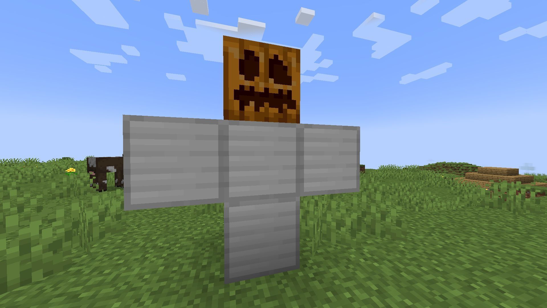 Configuration of blocks that creates an Iron Golem in Minecraft (Image via Mojang)