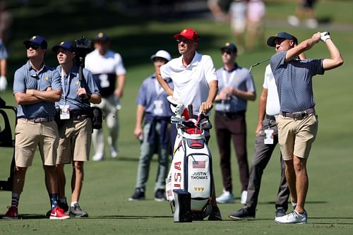 Justin Thomas from Team USA plays a practice shot. (Image via Rob Carr/Getty Images)