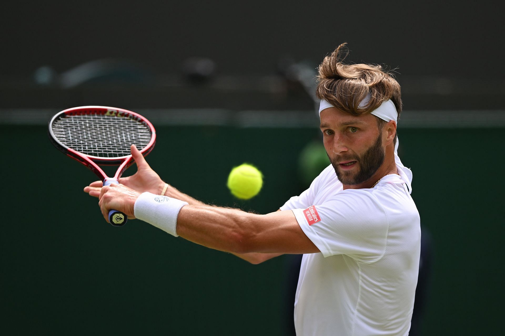 Liam Broady competing in Wimbledon