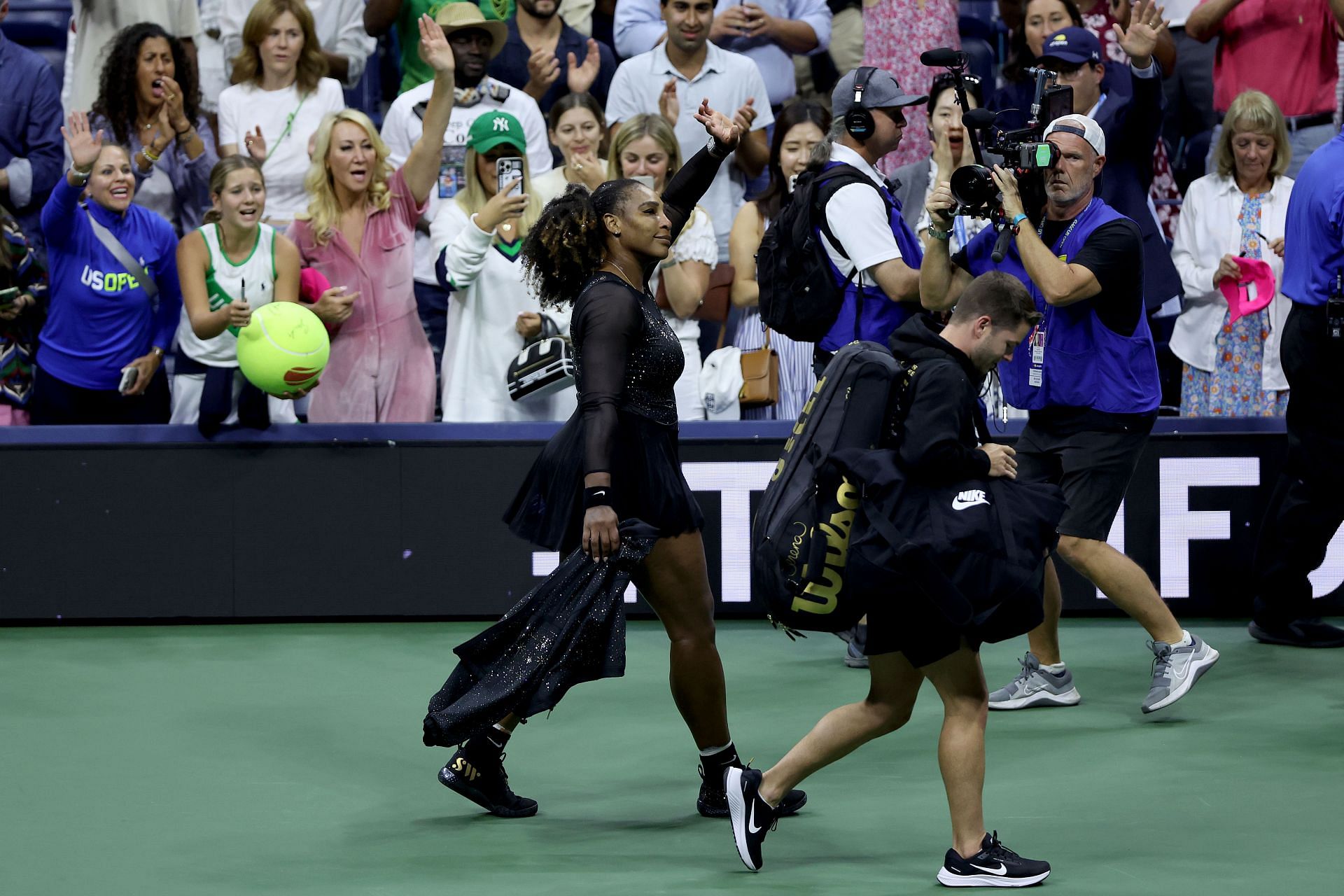 Serena Williams thanks the fans after being defeated by Ajla Tomlijanovic at the 2022 US Open 