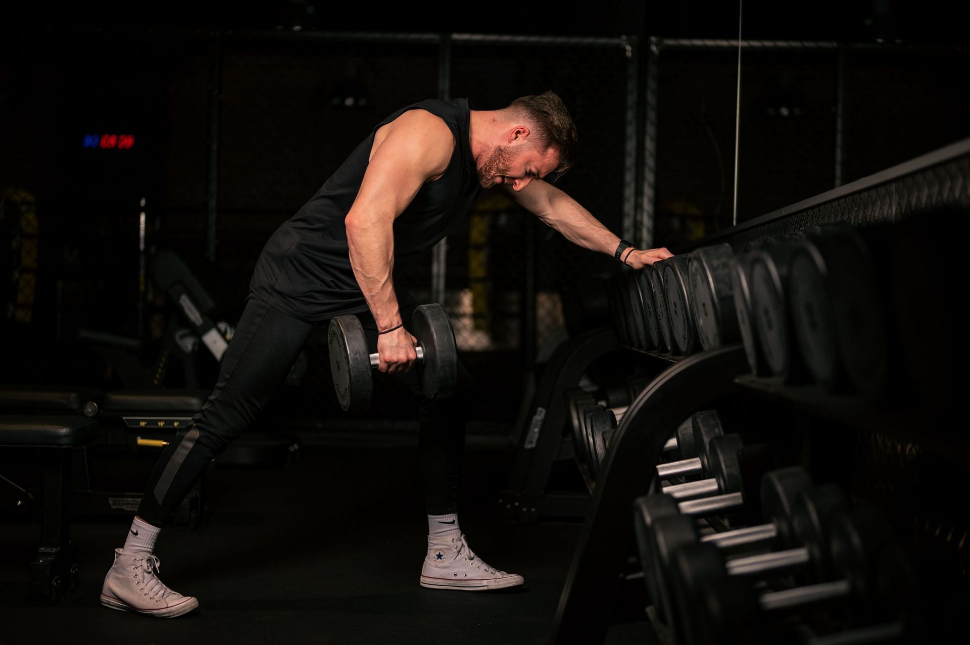 dumbbell exercises engage the glutes, and they also train many other muscles in the lower body including the core. (Image via Unsplash/ Bastien Plu)