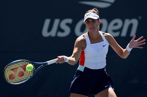 Bencic returns a shot against Sorana Cirstea at the 2022 US Open - Day 4