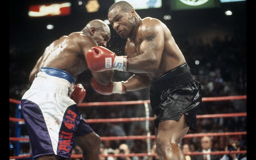 Evander Holyfield fought Mike Tyson twice in the 90s