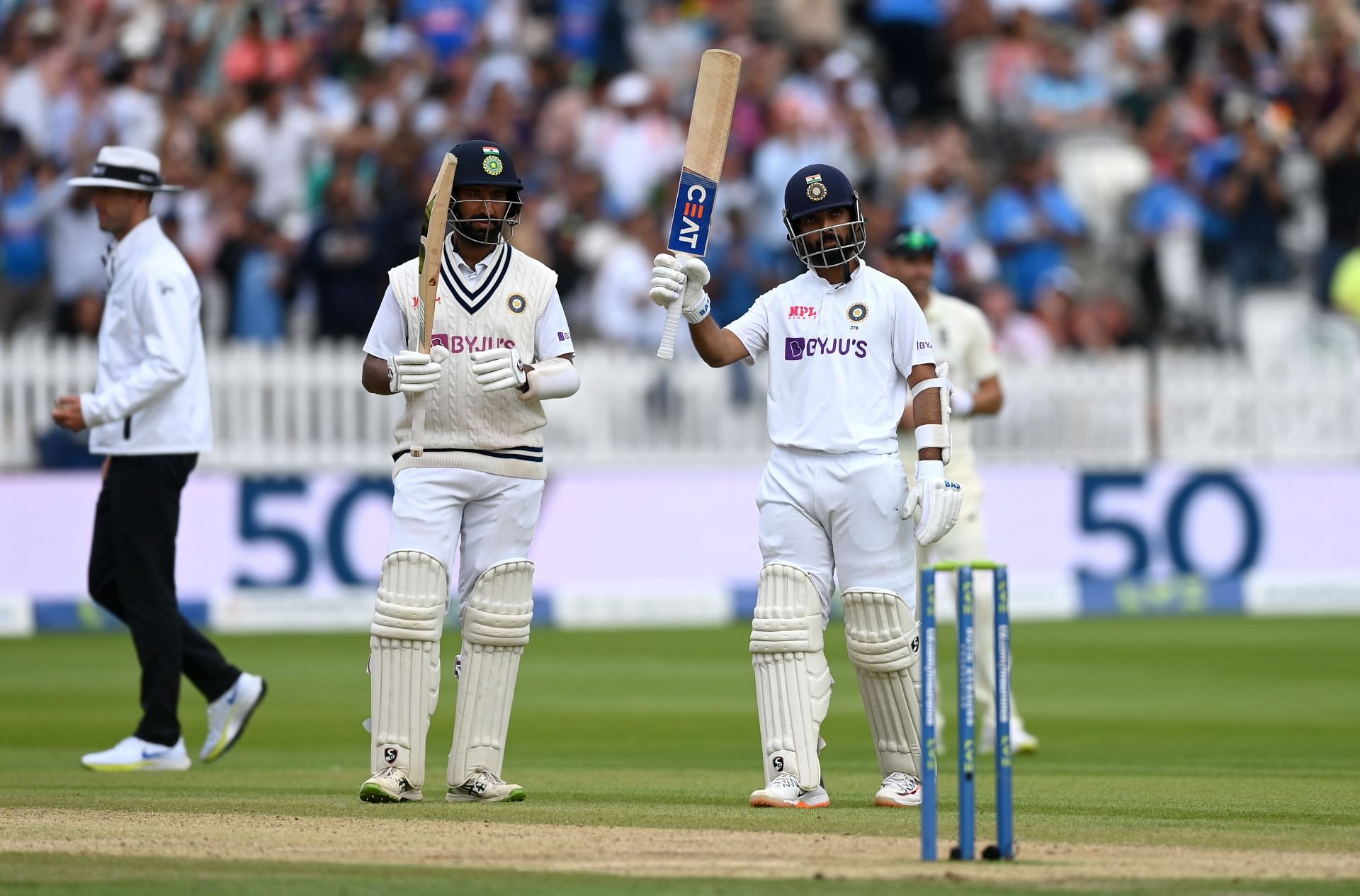 Ajinkya Rahane (right) raises his bat after reaching his half-century during the 2021 Lord&rsquo;s Test. Pic: Getty Images