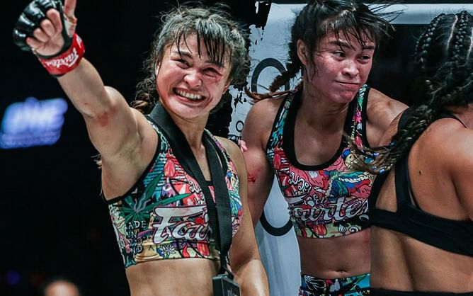 Fans react to Stamp Fairtex smiling after eating a spinning back fist