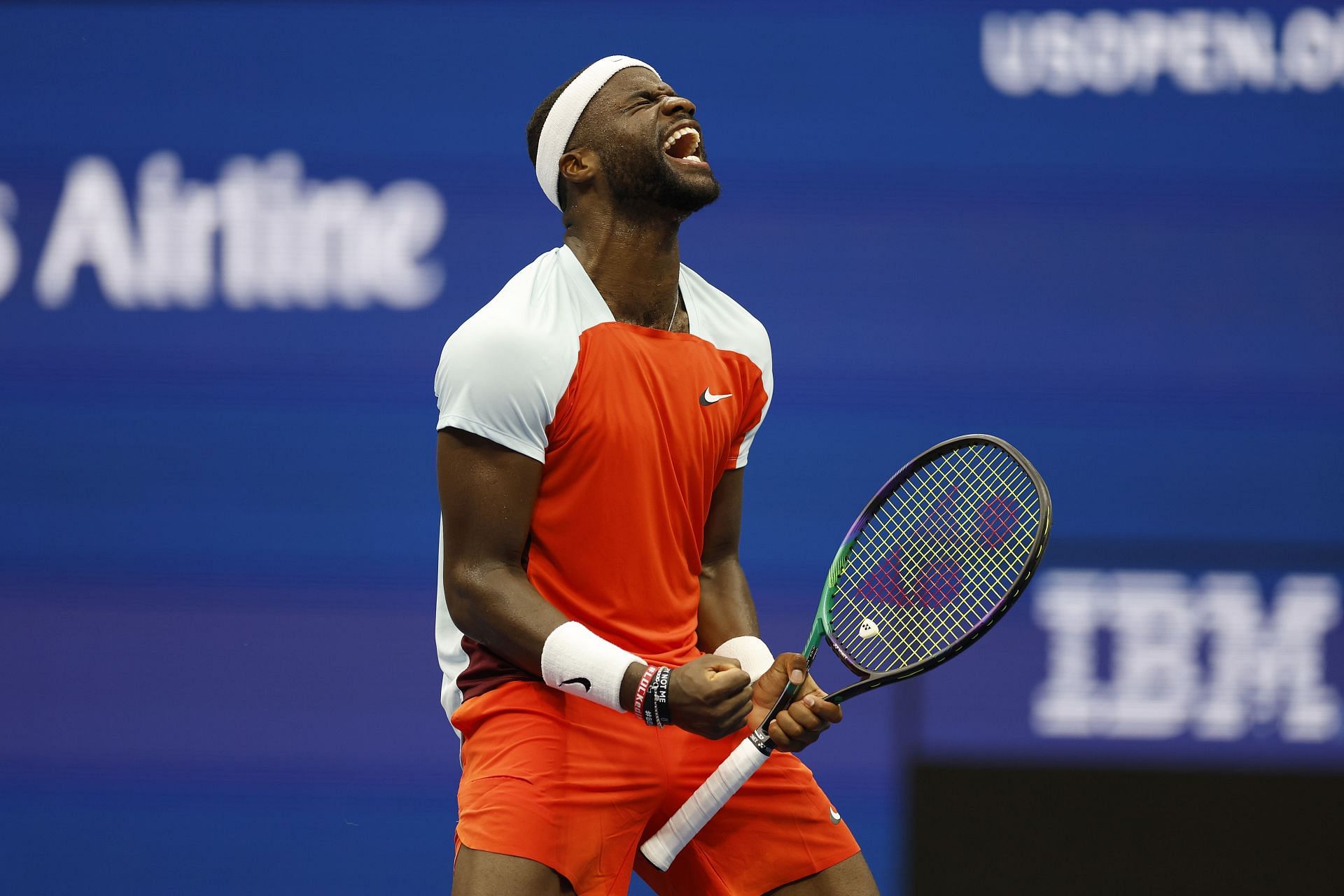 Frances Tiafoe celebrates his win against Andrey Rublev in the 2022 US Open quarterfinals.