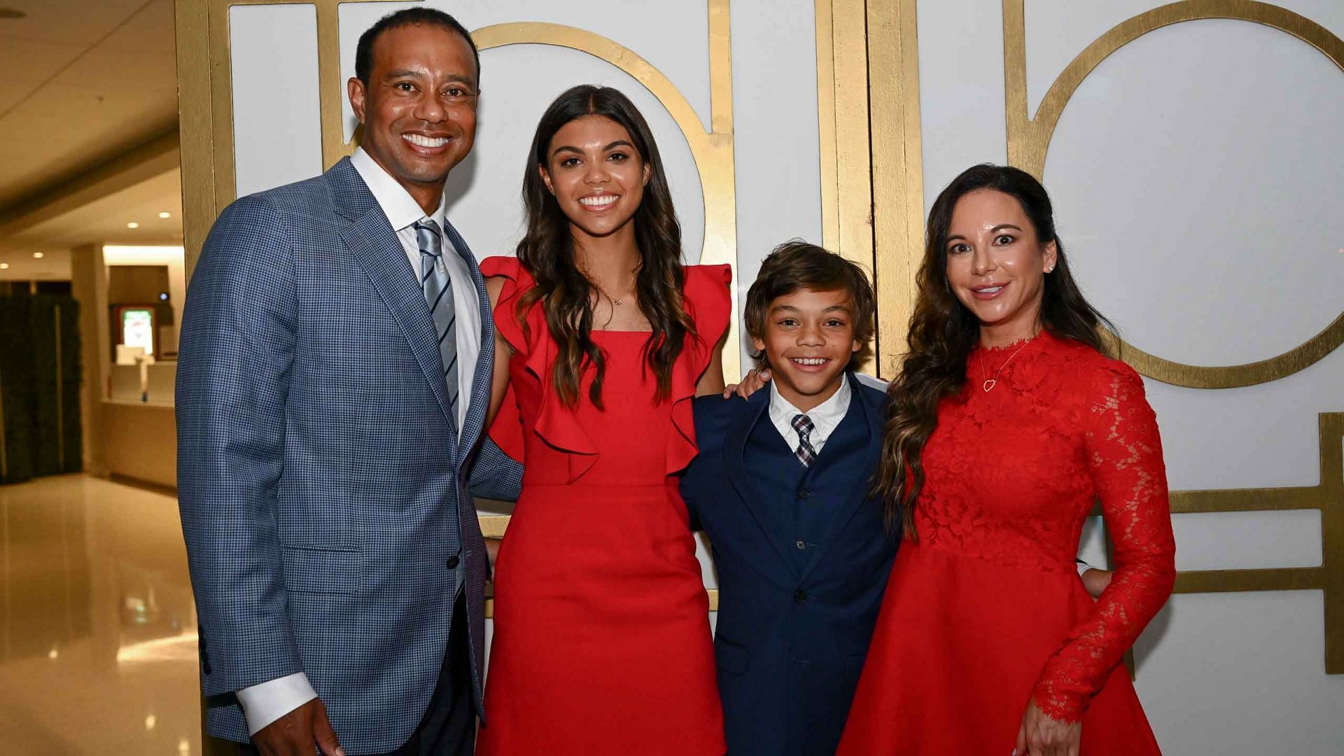 Tiger Woods with his family at the World Golf Hall of Fame in March 2022 (Image via Getty Images)