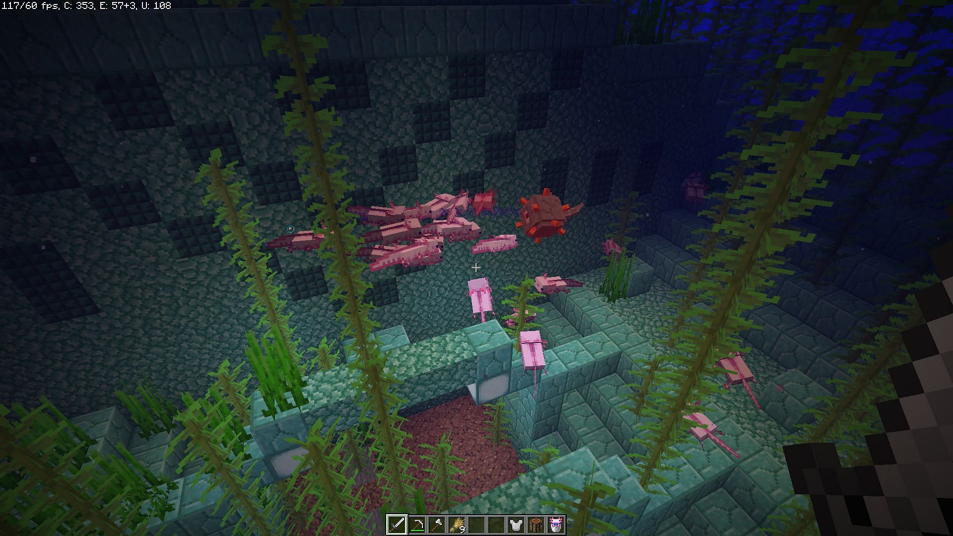 Army of Axolotls attacking a Guardian in Minecraft 1.19 (Image via Mojang)