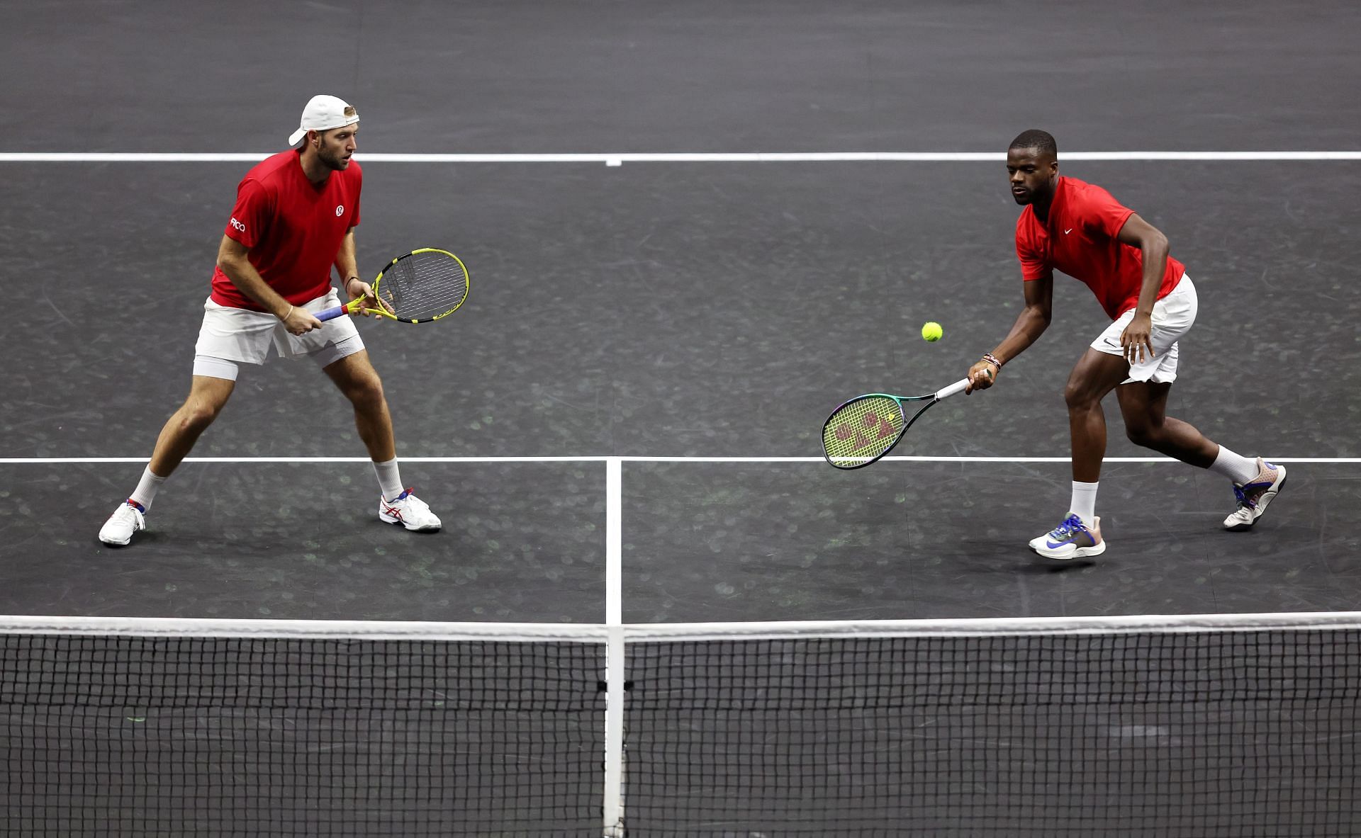 Jack Sock and Frances Tiafoe in action during their doubles match against Roger Federer and Rafael Nadal at the Laver Cup 2022