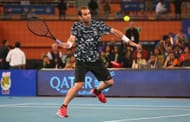 Pete Sampras plays a forehand