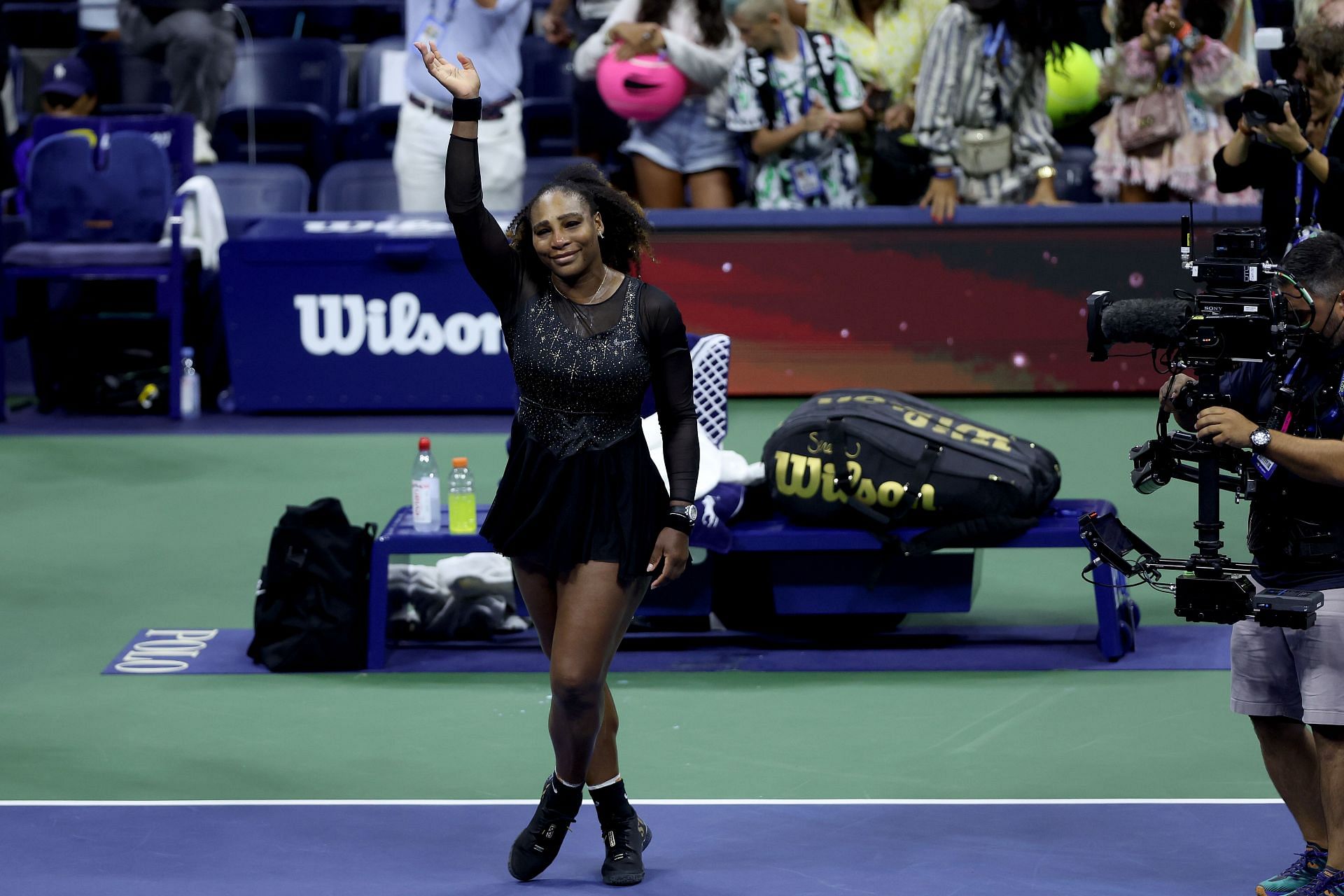 Serena Williams thanks the fans after being defeated by Ajla Tomlijanovic at the 2022 US Open