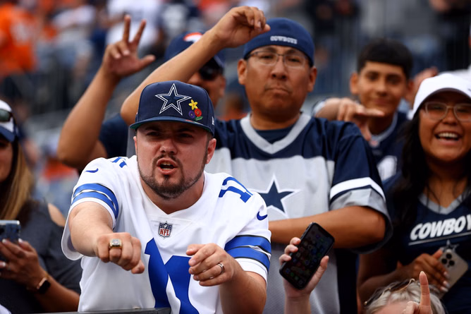 WATCH: Furious Cowboys supporters jump a fan following their defeat to Buccaneers