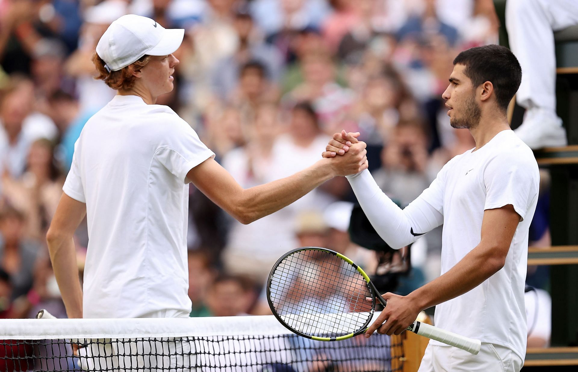 Jannik Sinner (L) and Carlos Alcaraz (R) at 2022 Wimbledon Championships