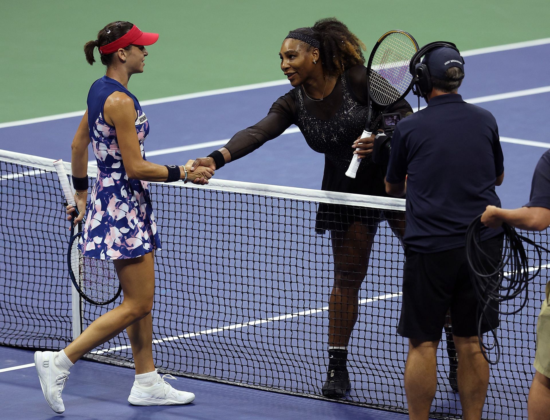 Alija Tomljanovic and Serena Williams shake hands before their 2022 US Open third-round clash.