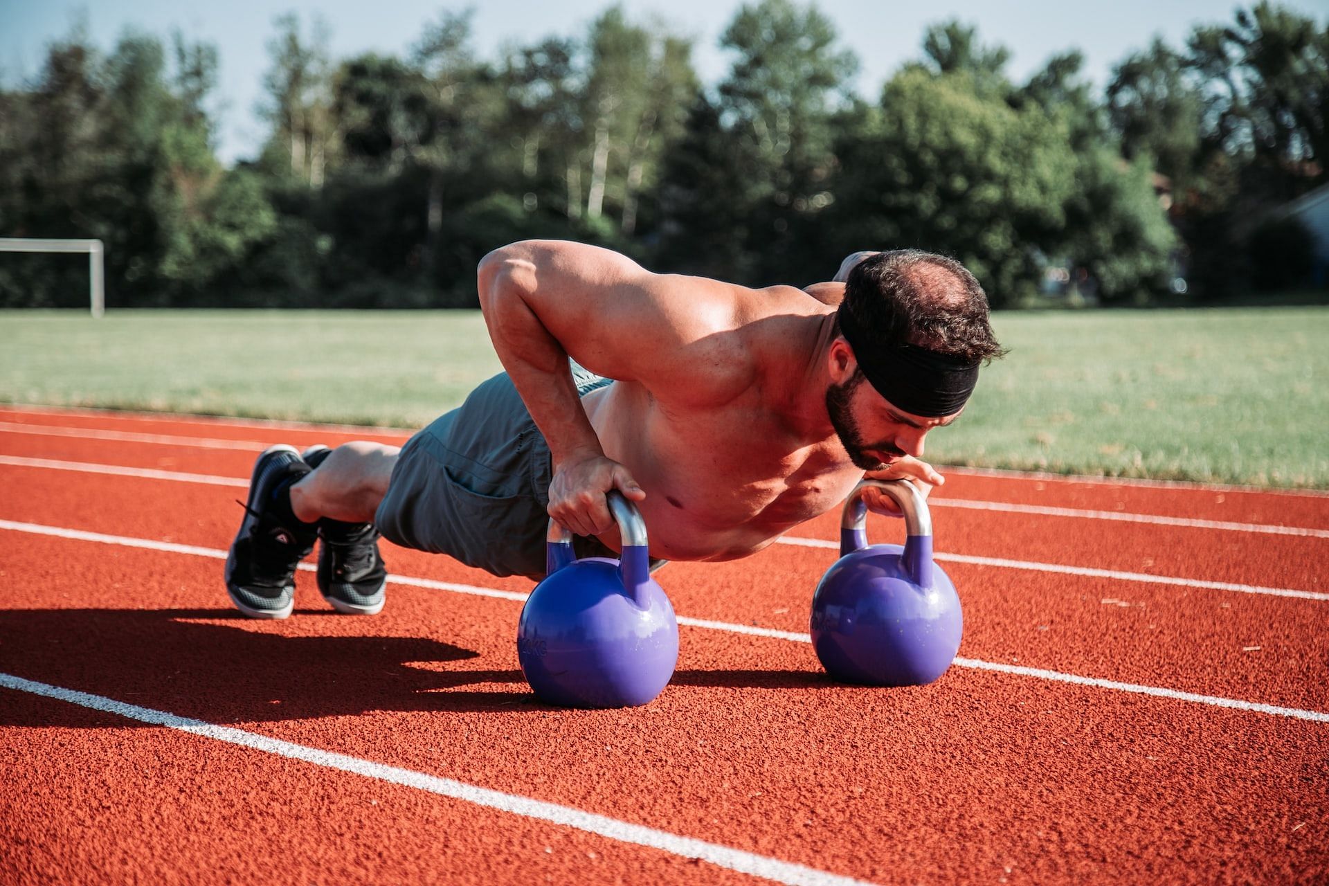 Kettlebell weight loss exercises for men and women. (Photo via Alora Griffiths/Unsplash)