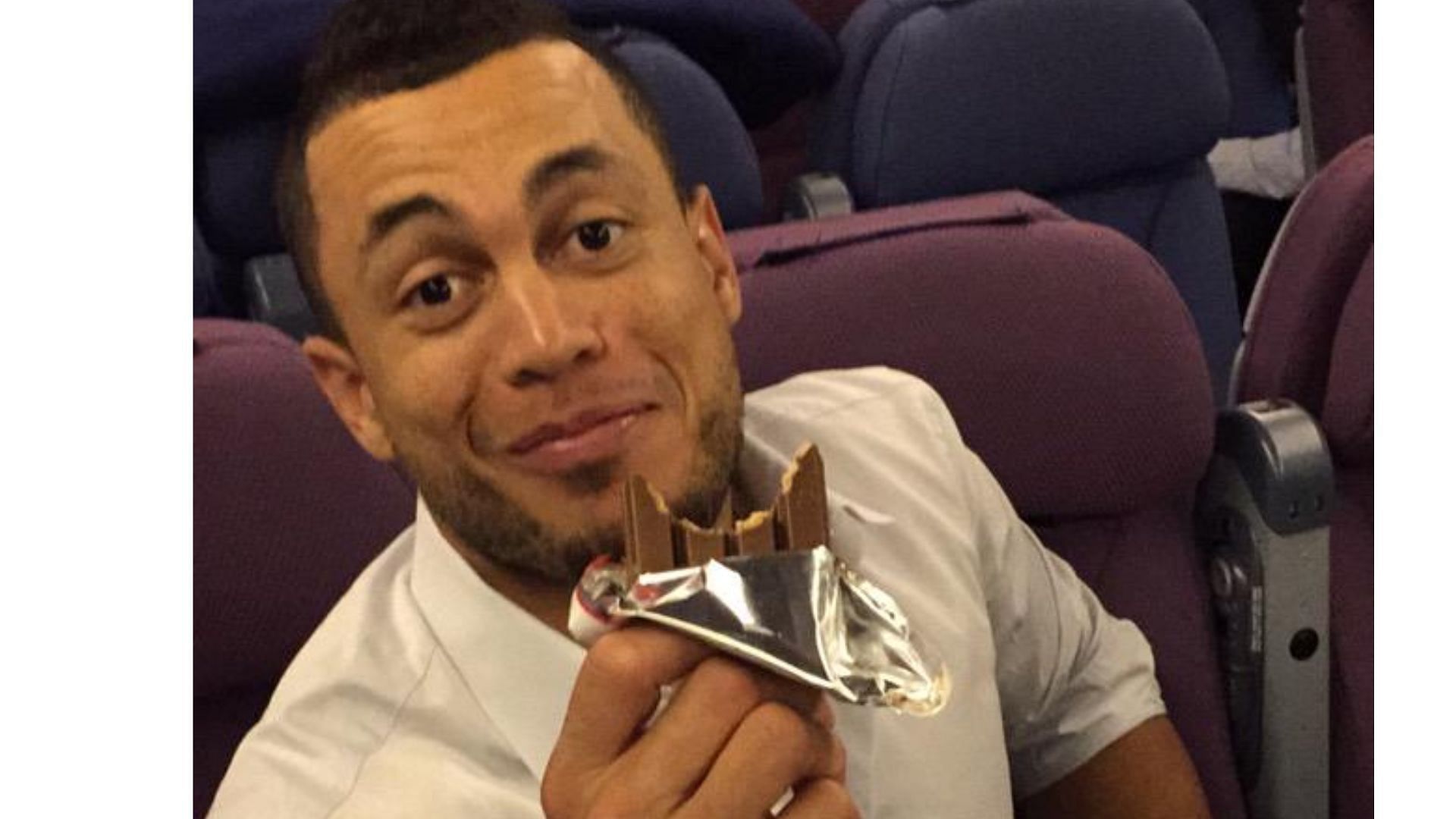 New York Yankees Giancarlo Stanton eating a kit kat bar during an interview with Jimmy Fallon.