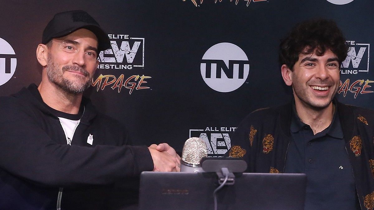 CM Punk and Tony Khan during their first-ever media scrum.