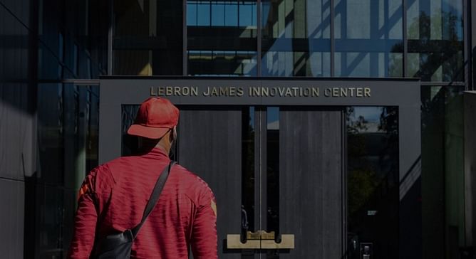 Video: LeBron James pops bottle of champagne in public, takes a celebratory sip for the grand opening of Nike building named after him