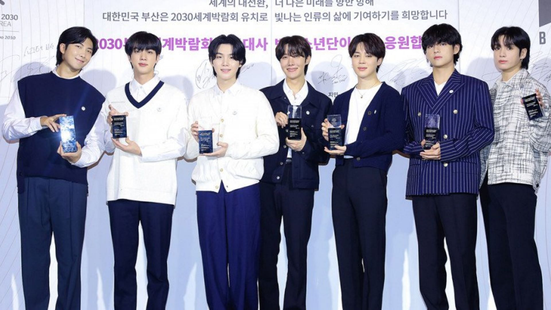 BTS members pose for Busan World Expo (Image via HYBE)