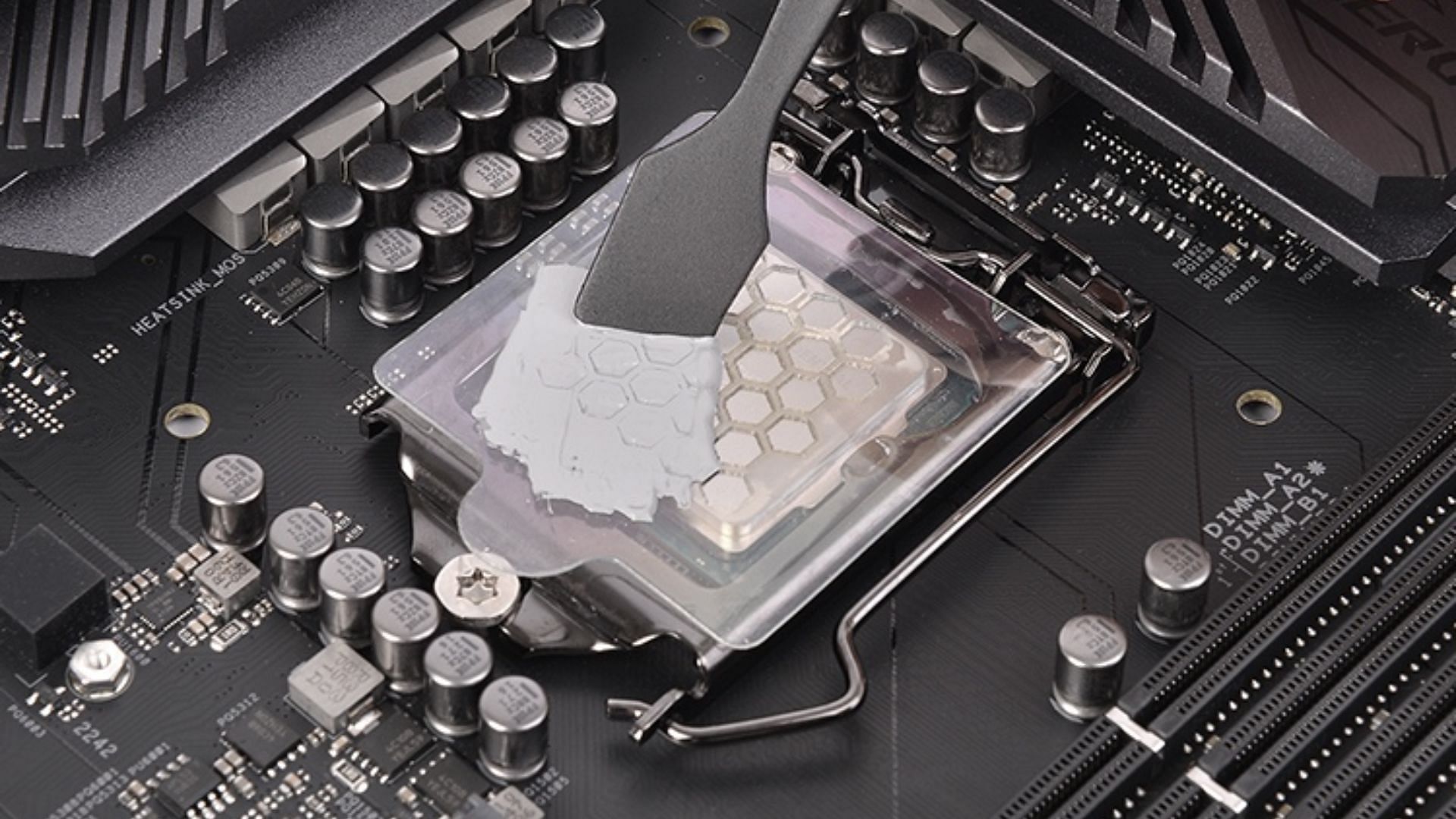 Applying thermal paste on a CPU (Image via Thermaltake)