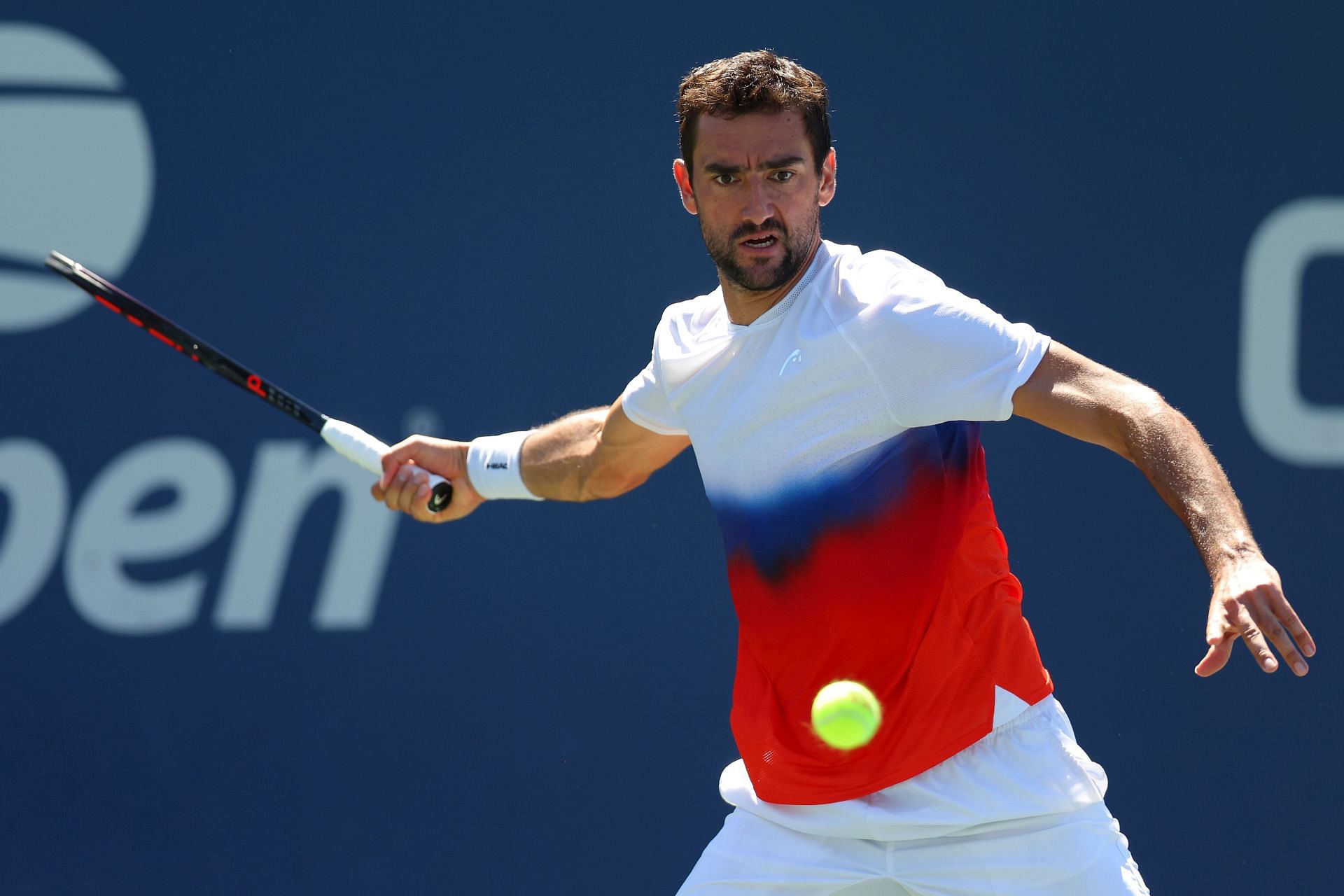 Marin Cilic plays a forehand against Albert Ramos-Vinolas of Spain at the 2022 US Open - Day 4