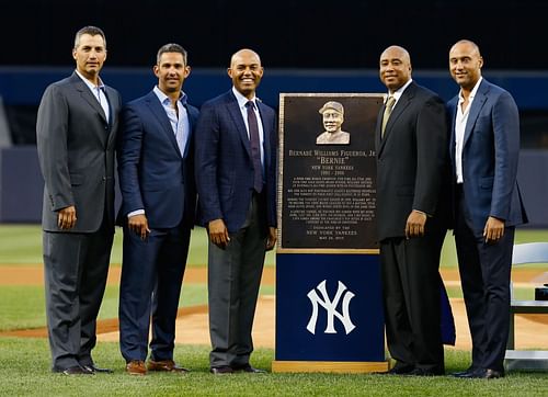 Posada poses with other former New York Yankees.