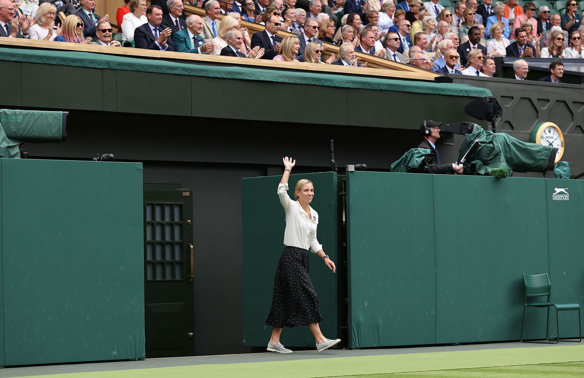 Angelique Kerber walks onto court during the Centre Court Centenary Celebration at Wimbledon