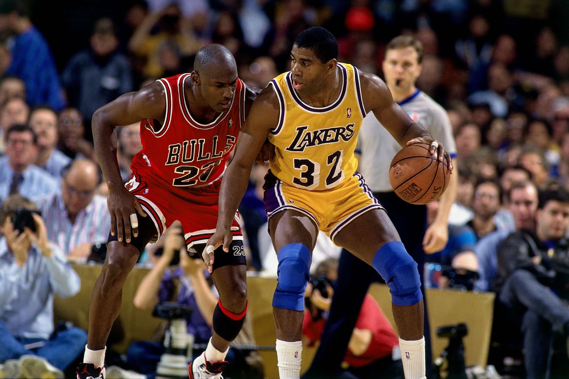 Michael Jordan of the Chicago Bulls shoots against Dennis Johnson