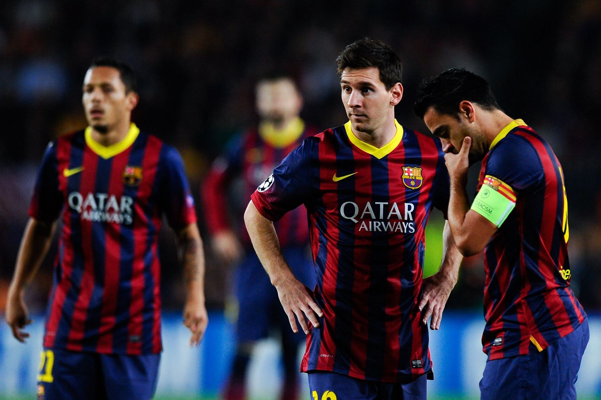 Messi and Xavi in action for Barcelona