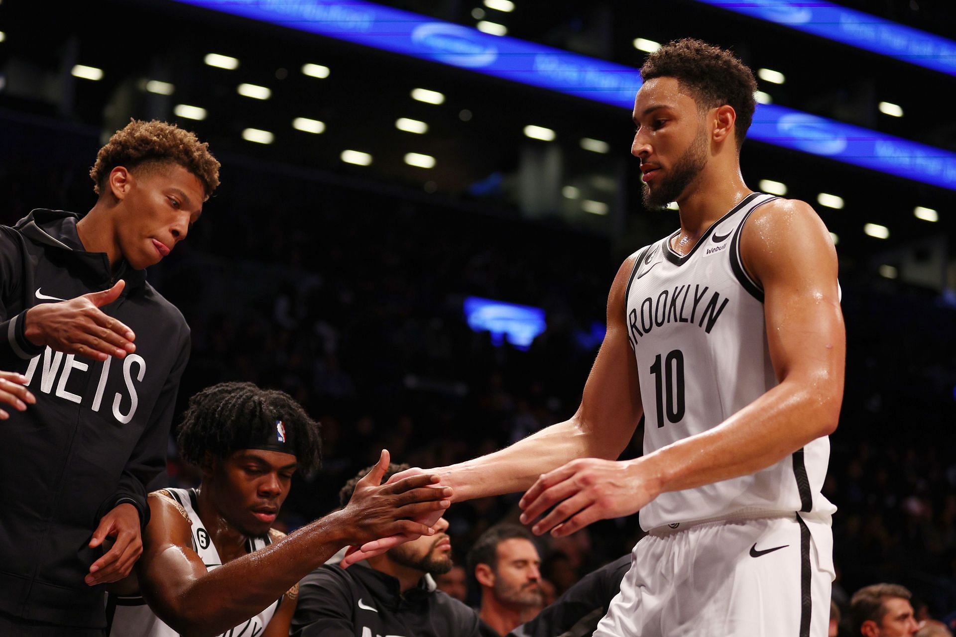 Ben Simmons of the Brooklyn Nets is congratulated by teammates