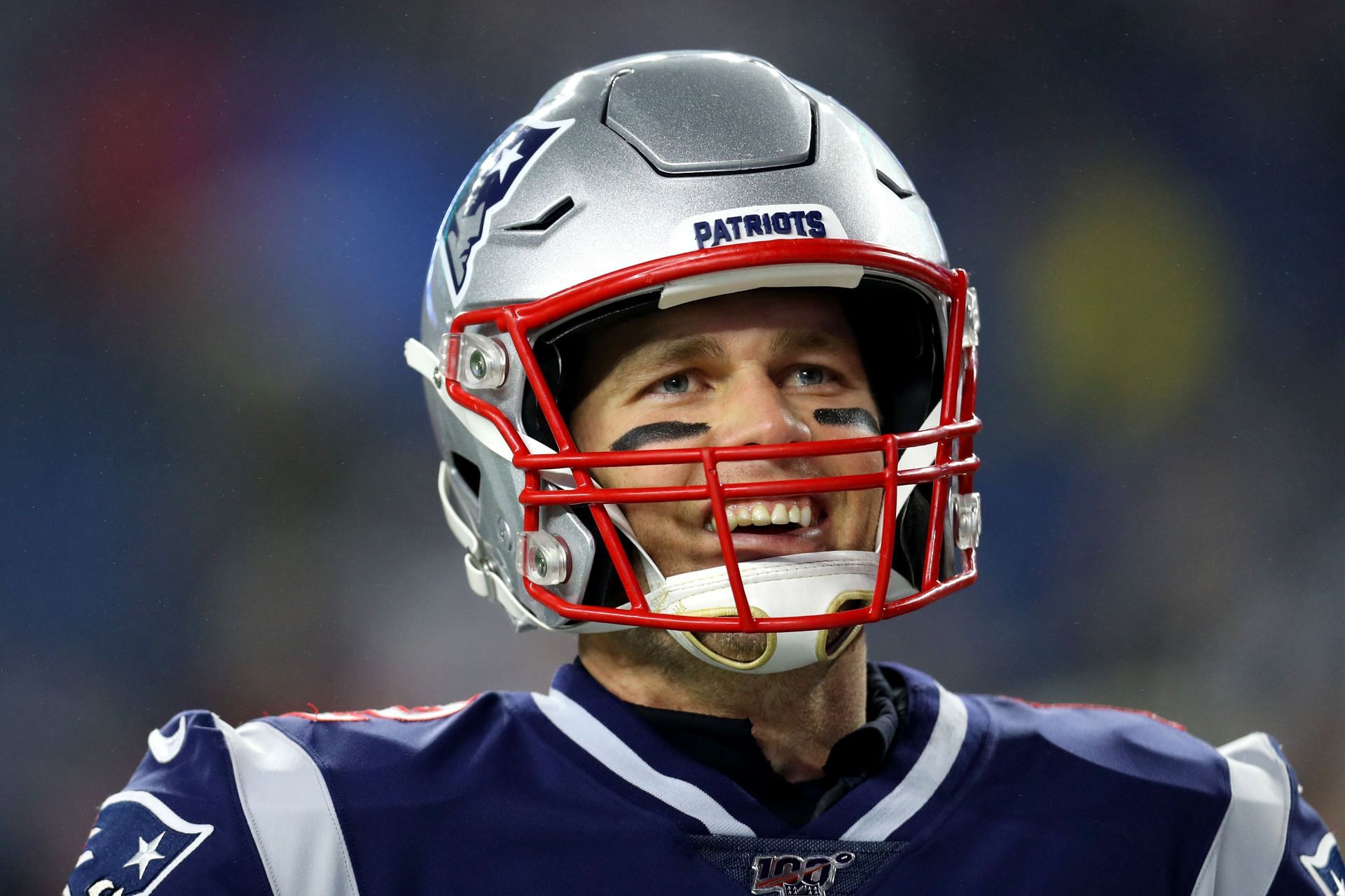 Fan sues Patriots, says they ruined his Tom Brady-signed flag