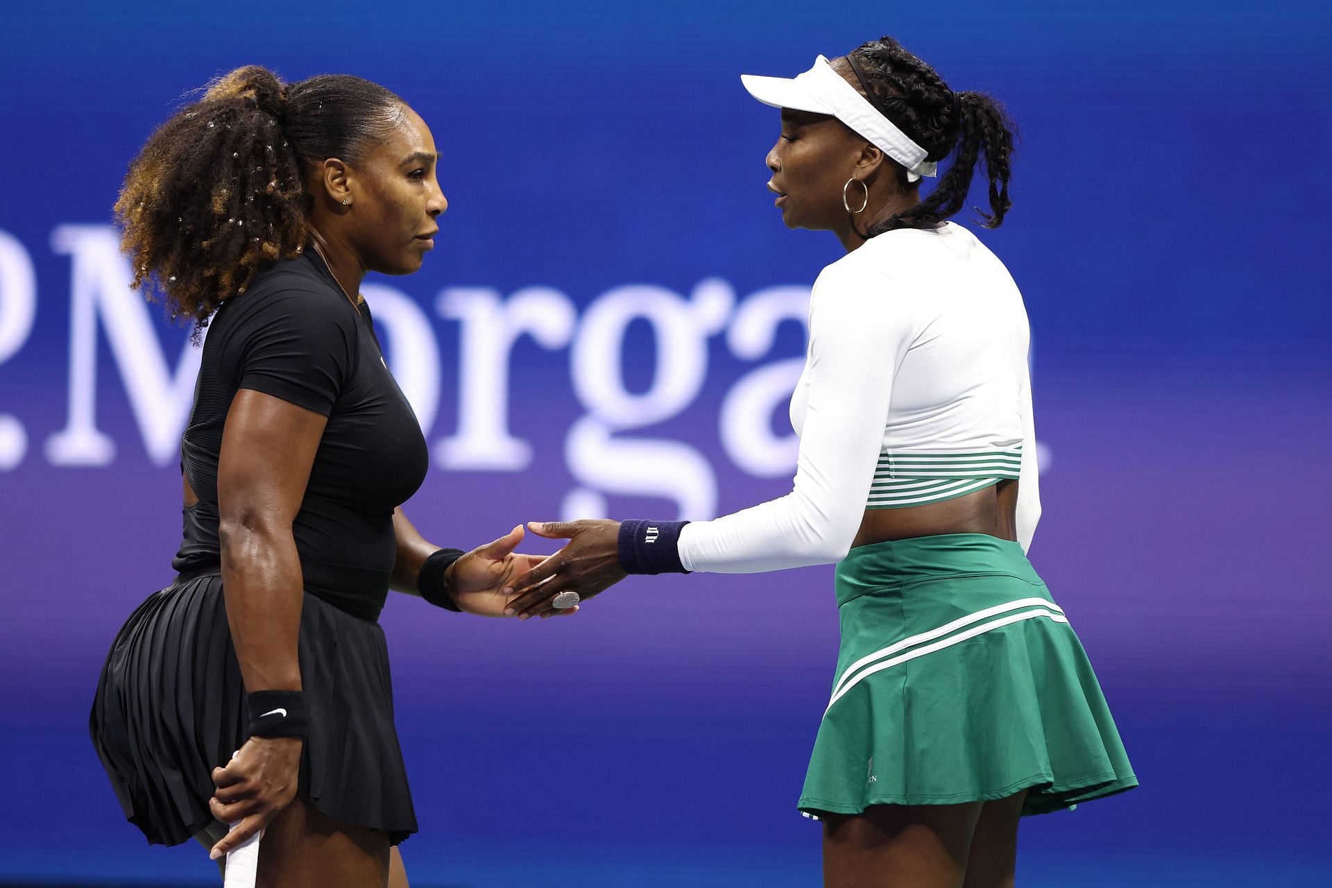 Serena Williams and Venus Williams pictured at the 2022 US Open.