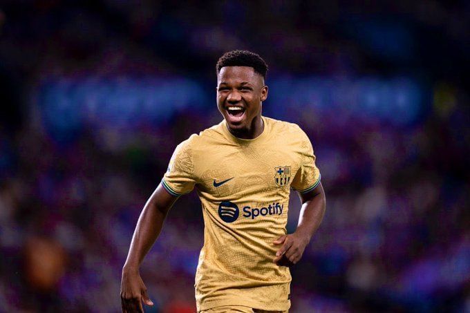 Real Madrid vs Barcelona football players on the field