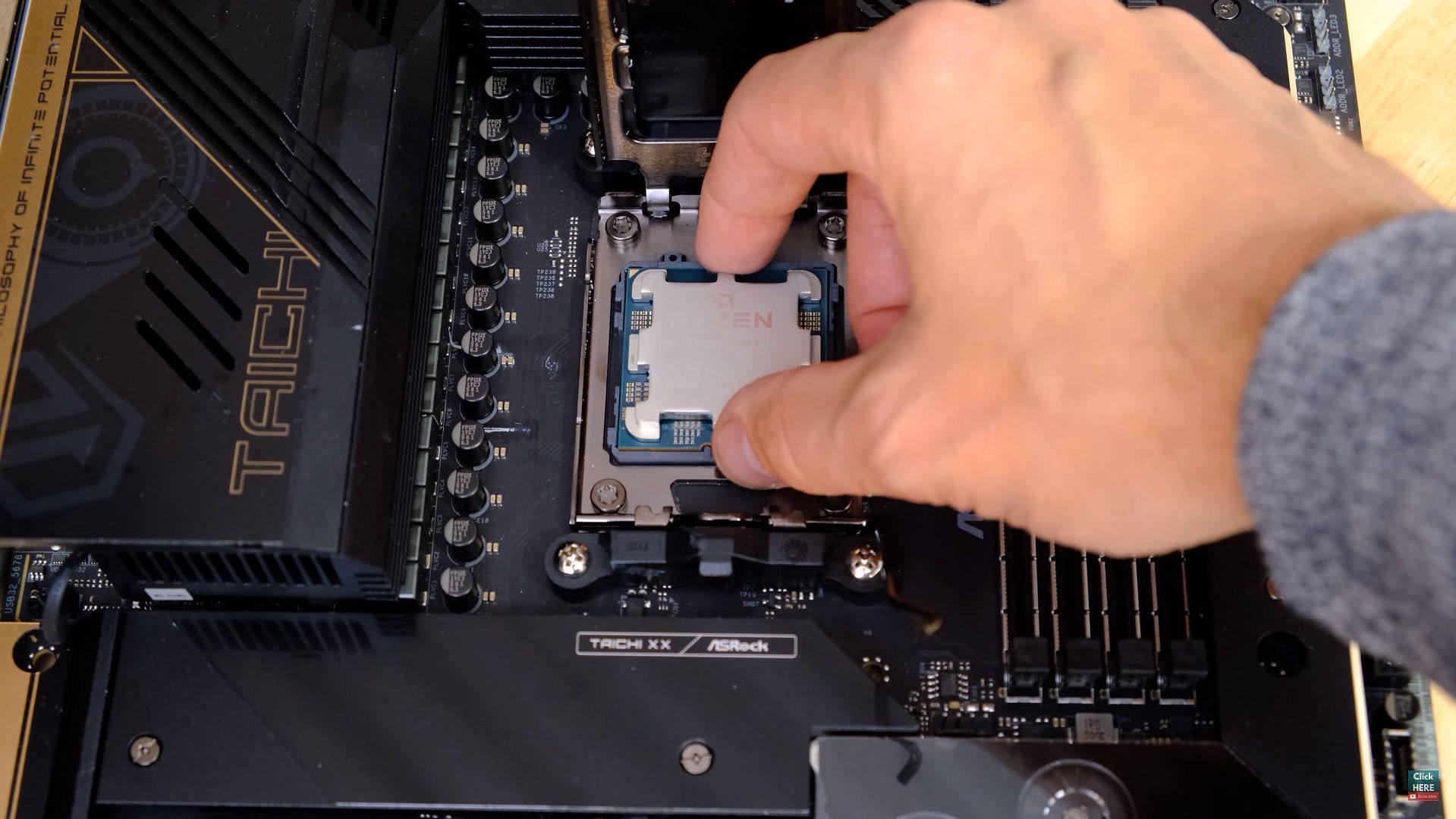 Installing a Ryzen 7000 chip (Image via CrazyTechLab/YouTube)