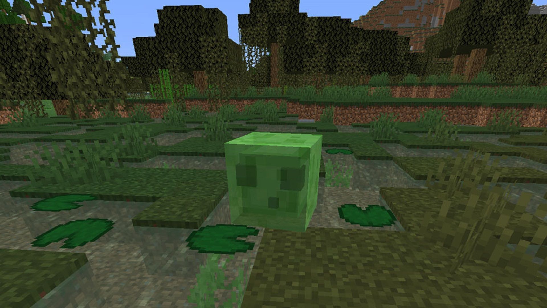 A slime mob roaming a swamp (Image via Mojang)