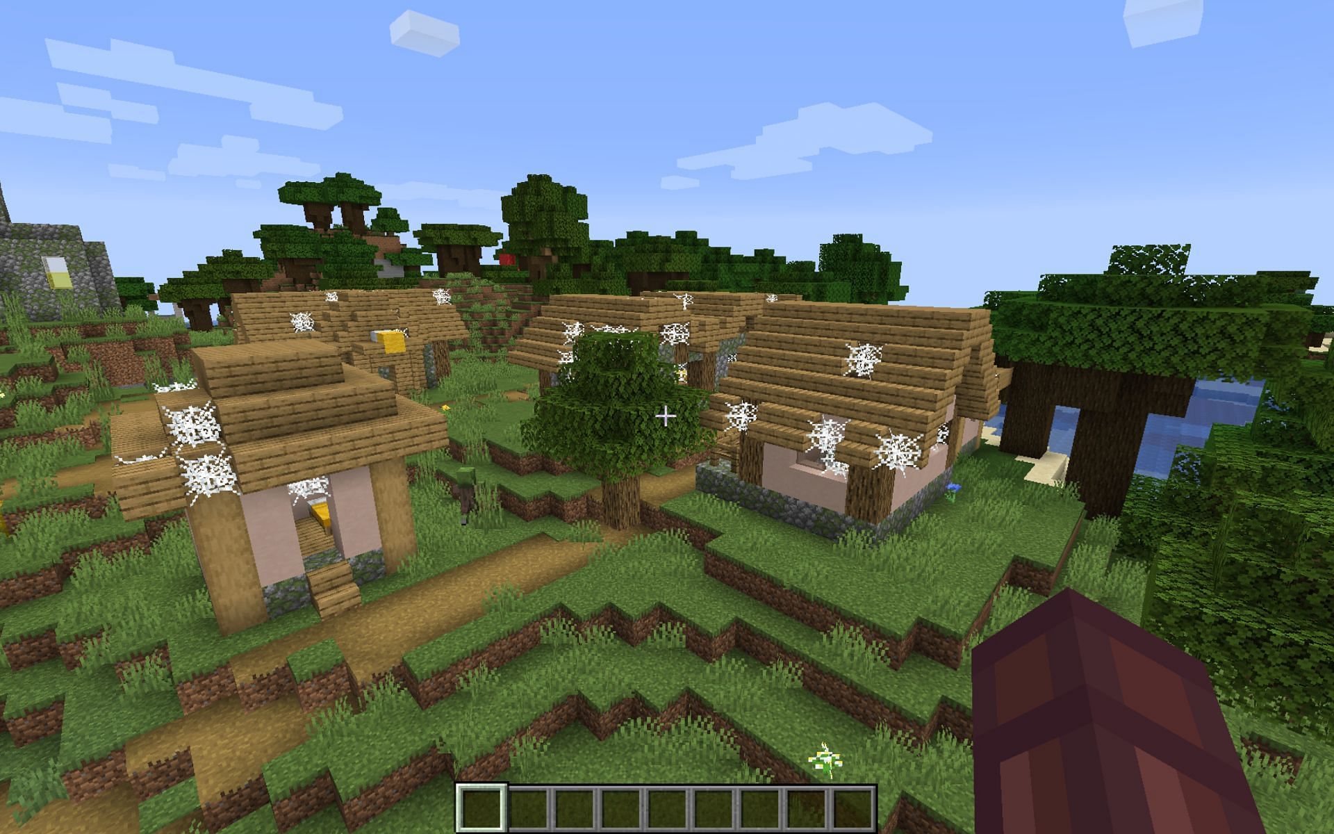 A zombie village in Minecraft (Image via reddit/u/Imagine_Wagonsss)