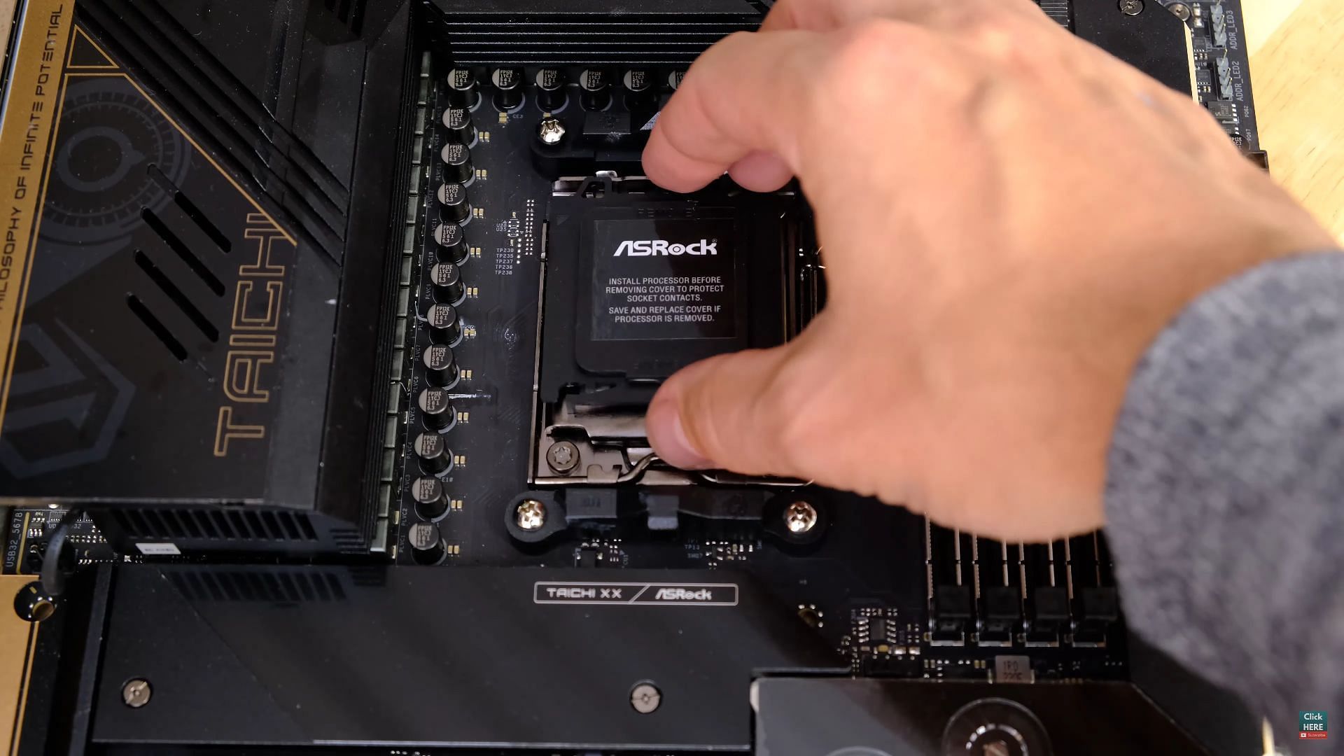 The plastic cover pops off once the chip has been successfully installed (Image via CrazyTechLab/YouTube)