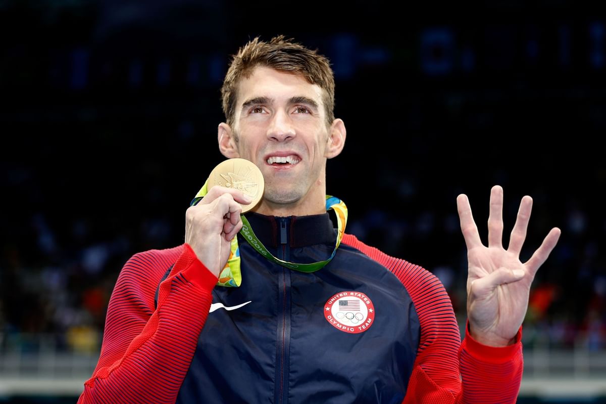 How many world records does Michael Phelps still have?