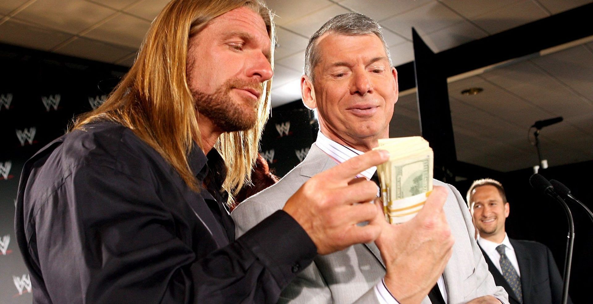 Triple H(left) and Vince McMahon(right)