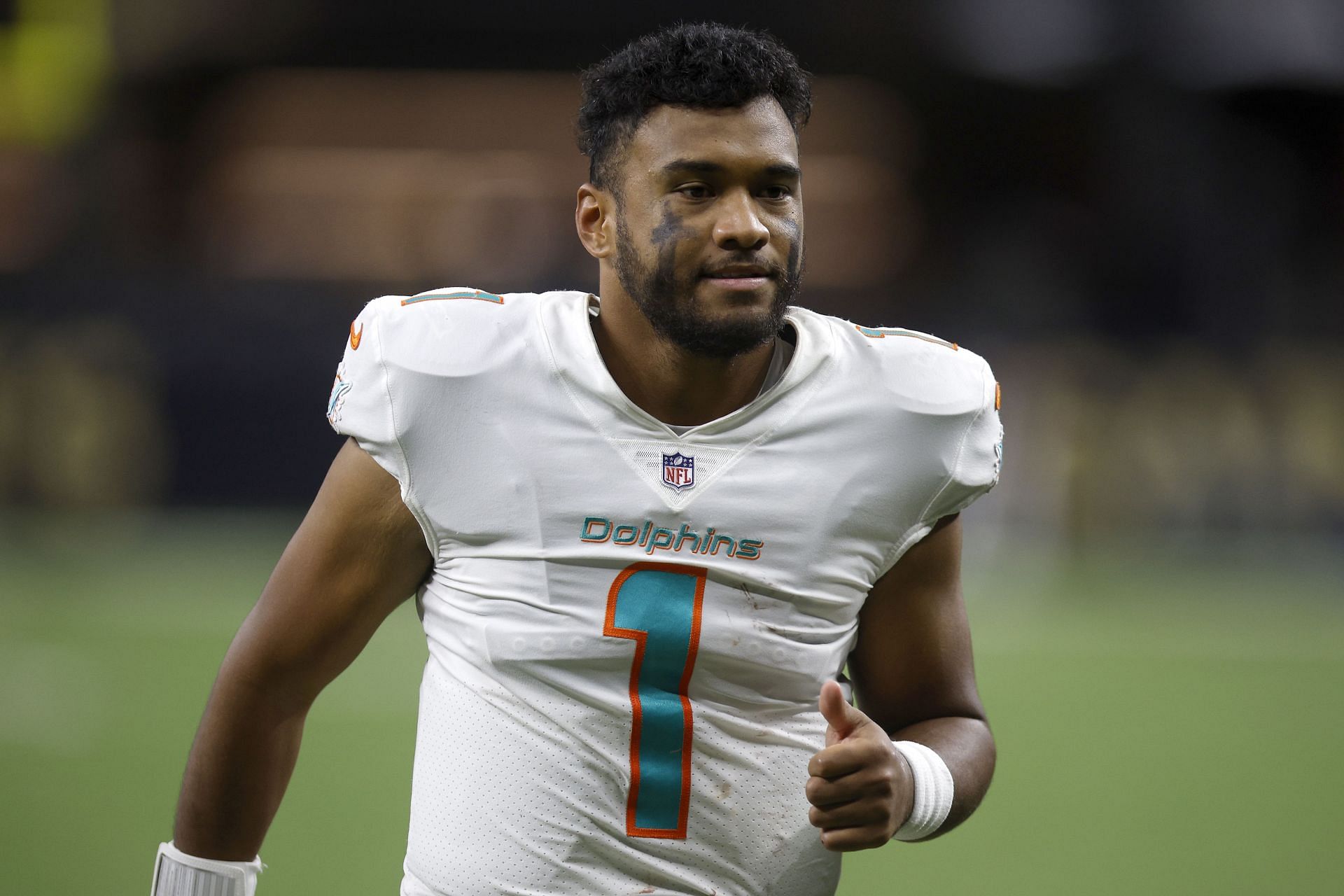 Dolphins' Tagovailoa taken to hospital after head injury, questions raised  about concussion protocol