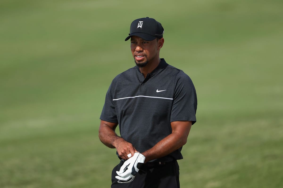 What brand golf glove does Tiger Woods use?