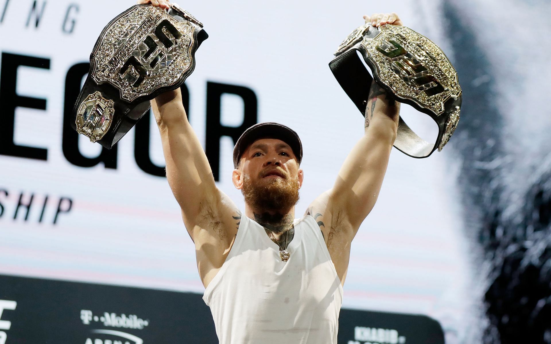 Conor McGregor poses for the cameras after a press conference for UFC 229