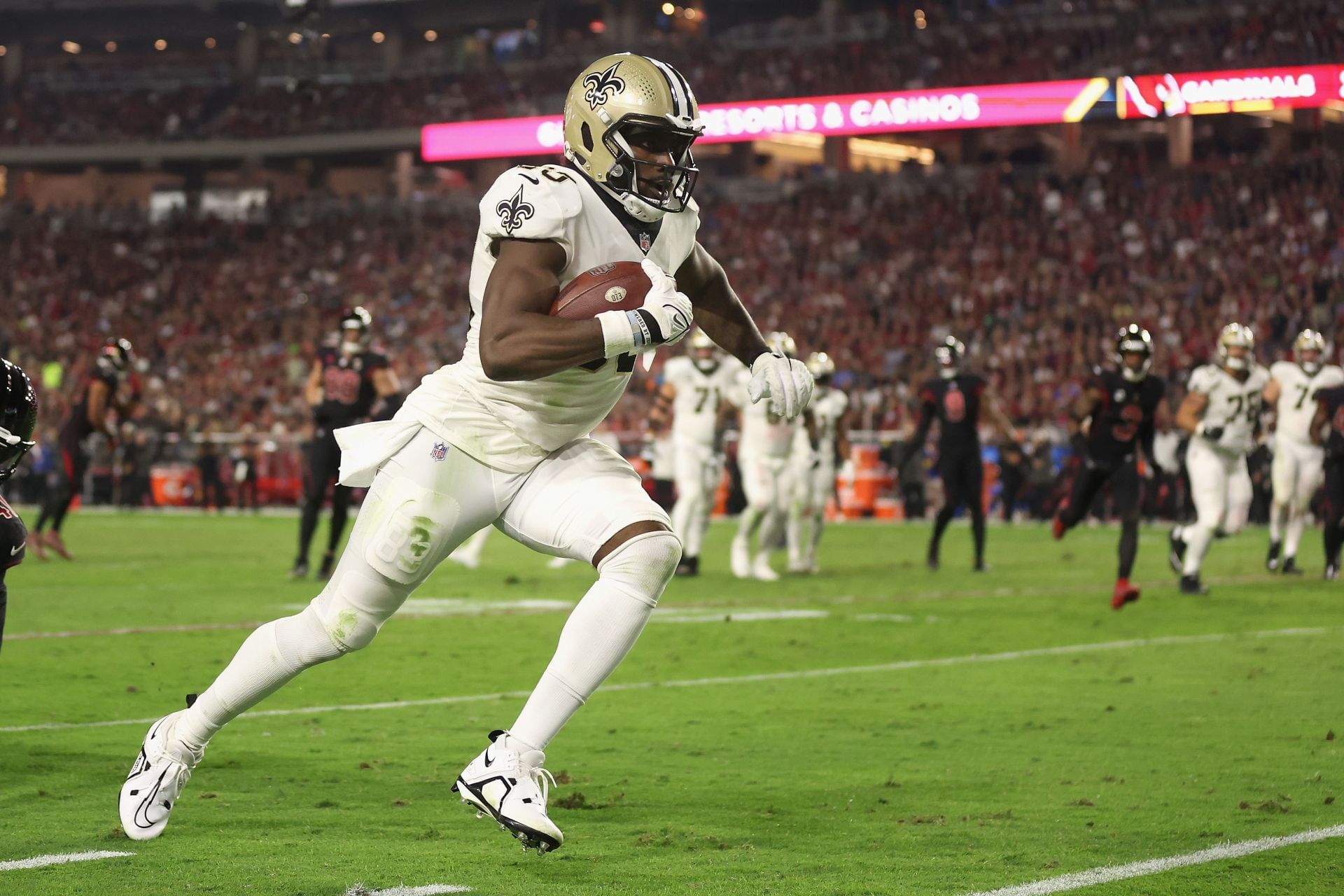 New Orleans Saints tight end Juwan Johnson (83) warms up before an NFL  preseason football game against the Los Angeles Chargers, Friday, Aug. 26,  2022, in New Orleans. (AP Photo/Tyler Kaufman Stock