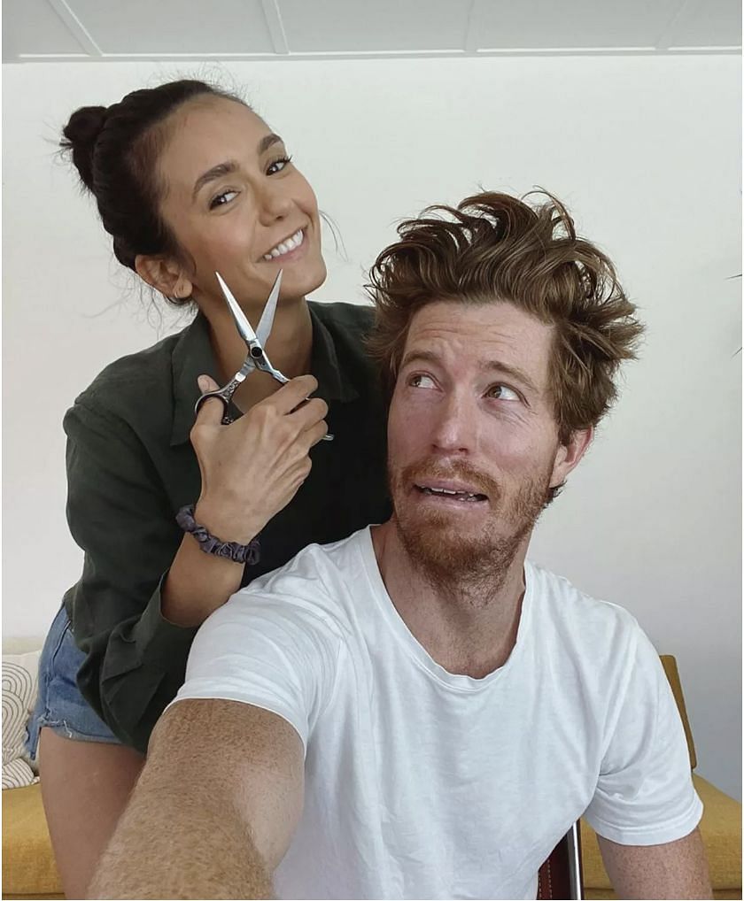 Nina Dobrev shared a &quot;quarantine haircut&quot; picture on social media with boyfriend Shaun White. (Image via Instagram)