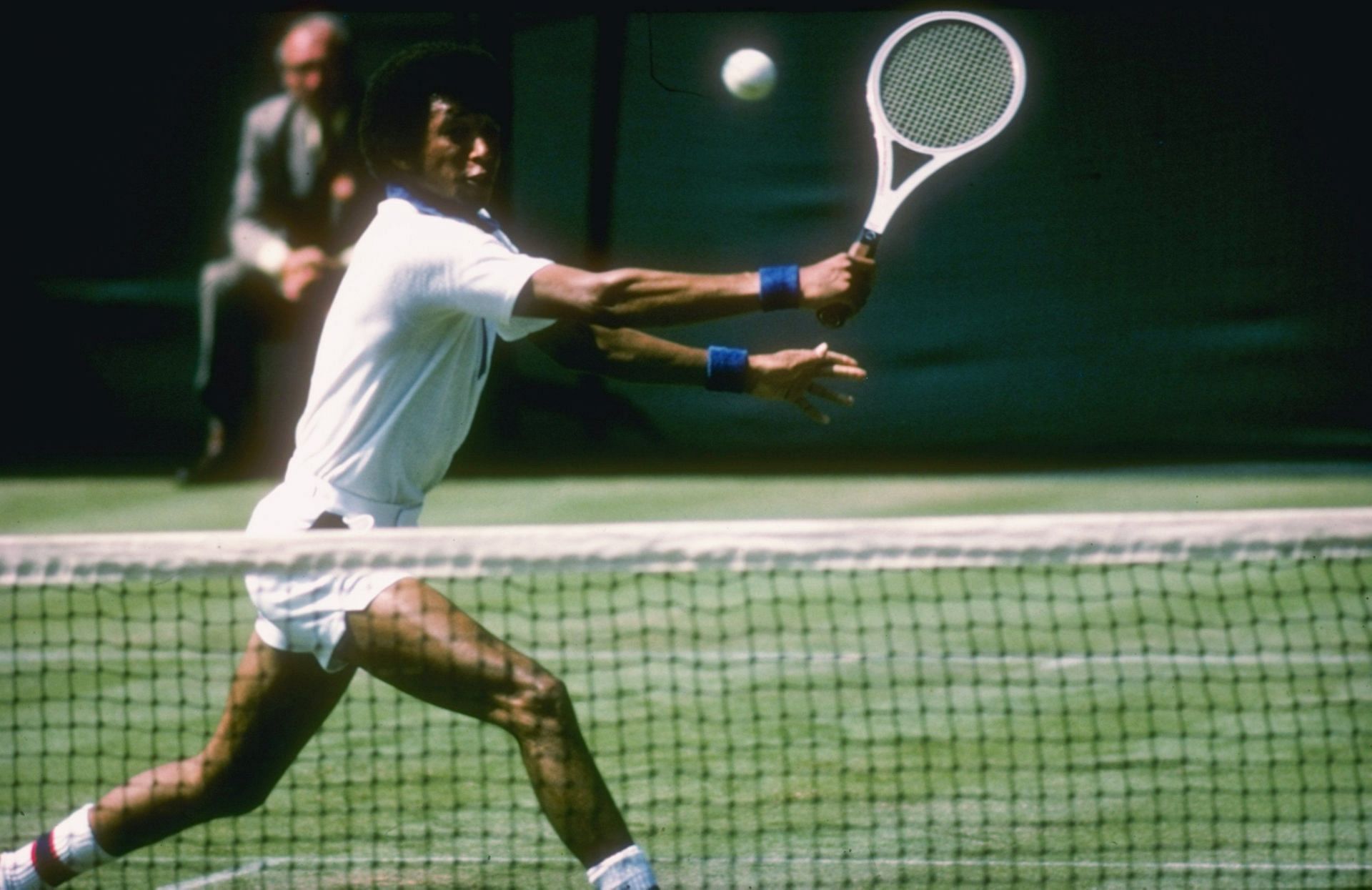 Arthur Ashe during a match at Wimbledon